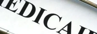 A close up of the word medicaid on paper