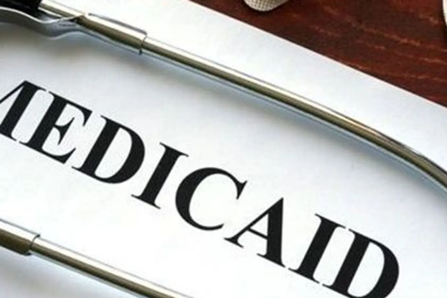 A close up of the word medicaid on paper