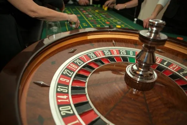 A roulette wheel with the number twenty eight on it.