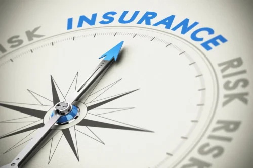 A compass with the word insurance on it.