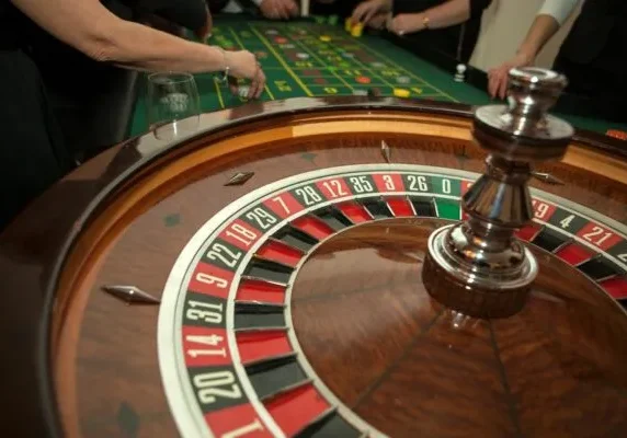 A roulette wheel with the number twenty eight on it.