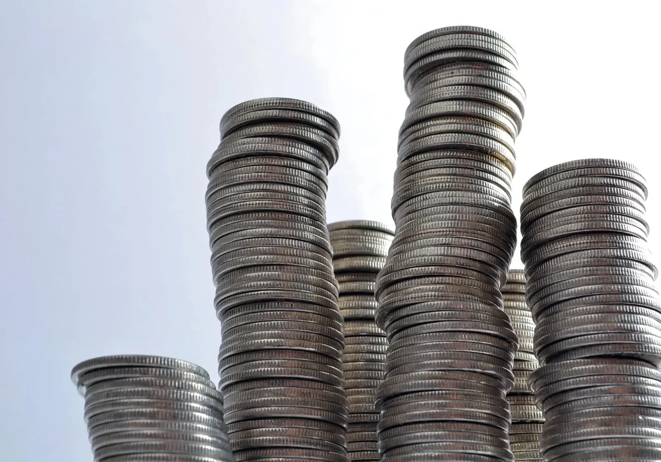 A pile of coins sitting on top of each other.